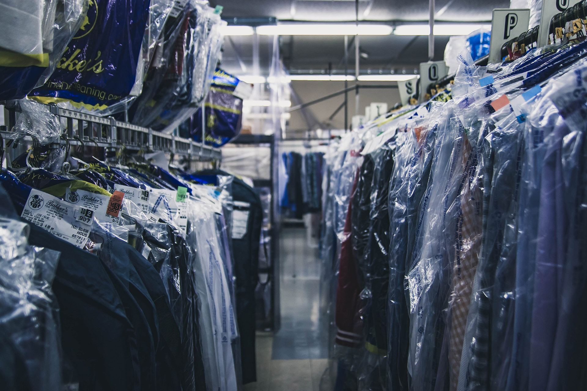 racks dry cleaning plastic bags clothing laundry